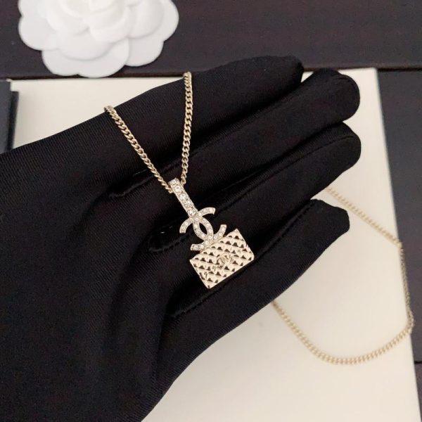 replik,replica,schmuck,1:1,beste,ohrringe,ring,Repliken Chanel hellgoldene Taschenperlenkette
