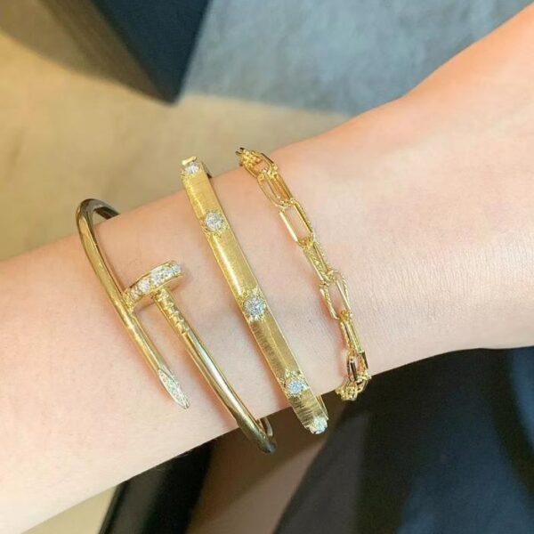 replik,replica,schmuck,1:1,beste,ohrringe,ring,Repliken Cartier-Nagelarmband in Counter-Qualität aus 18-karätigem Echtgold und Diamanten (DF5E)